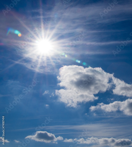 white fluffy clouds in the blue sky