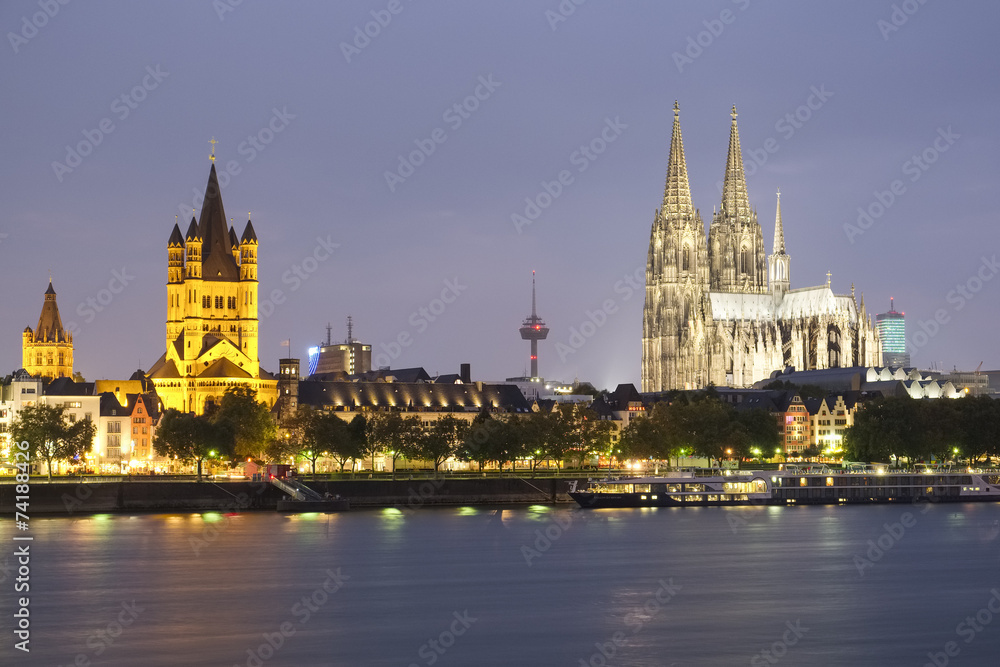 Cologne Cathedral and Great Saint Martin Church at dusk