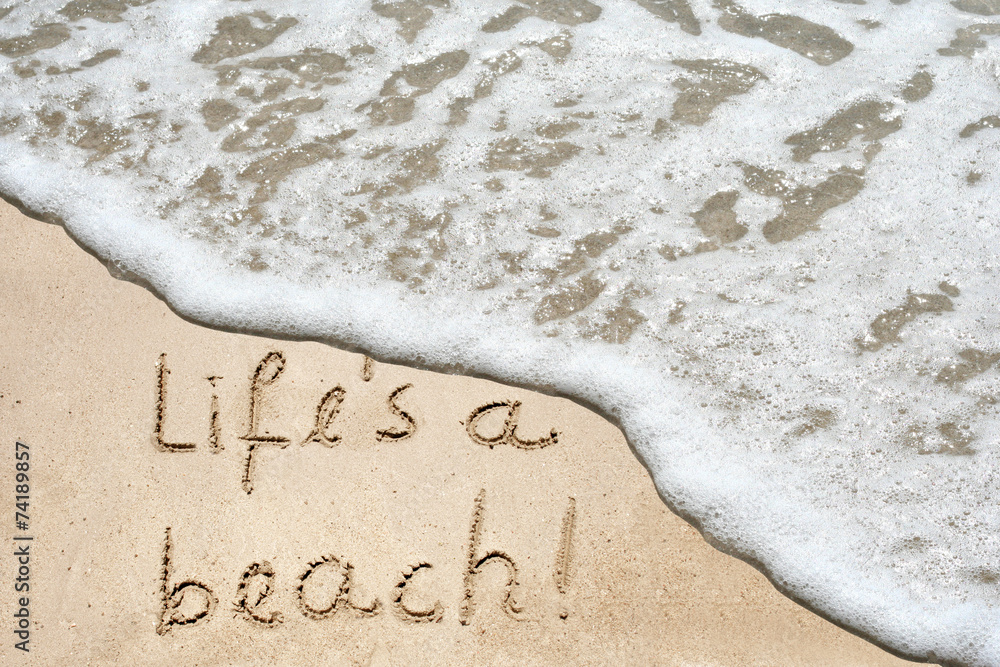 Conceptual life is a beach text in sand and water Conceptual life is a beach text in sand and water