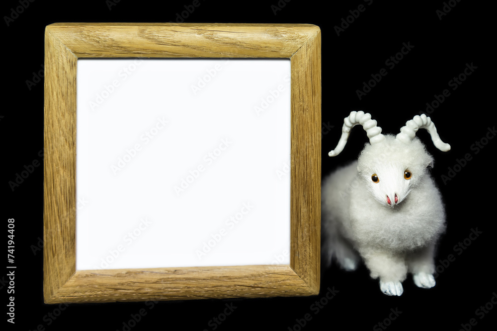 Goat or sheep with blank wood frame Goat or sheep with blank wood frame