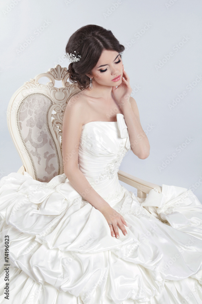 Bride. Beautiful brunette woman wearing in modern wedding dress Bride. Beautiful brunette woman wearing in modern wedding dress