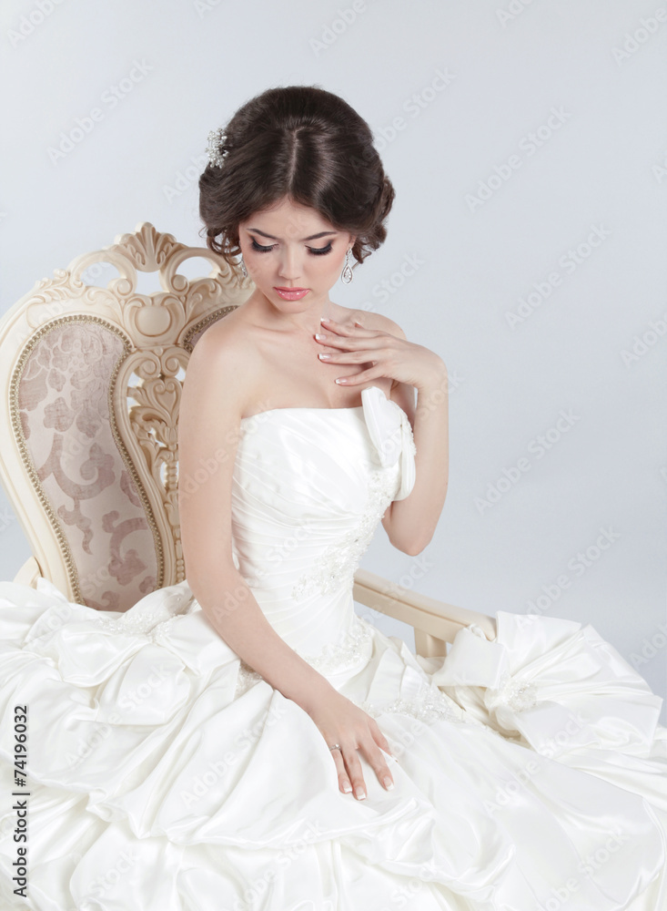 Bride. Beautiful brunette woman wearing in modern wedding dress Bride. Beautiful brunette woman wearing in modern wedding dress