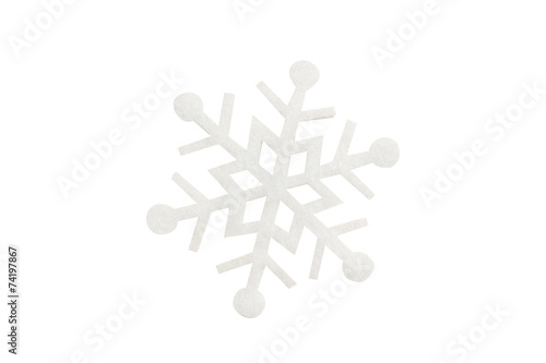 snowflake made of felt on a white background