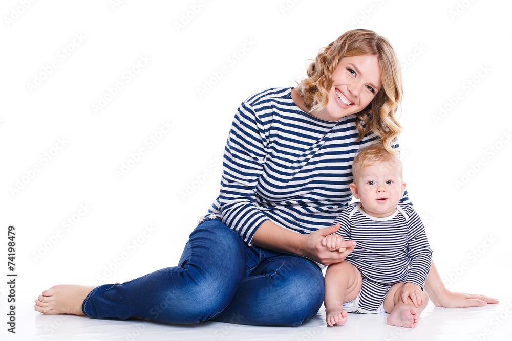 Young mother playing with her little son. Young mother playing with her little son.