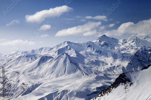 Snowy winter mountains in sun day © BSANI