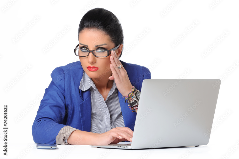 nervous and sad young business woman at the desk with a laptop nervous and sad young business woman at the desk with a laptop