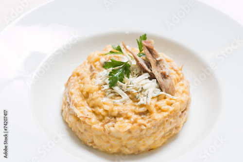 Duck meat with risotto