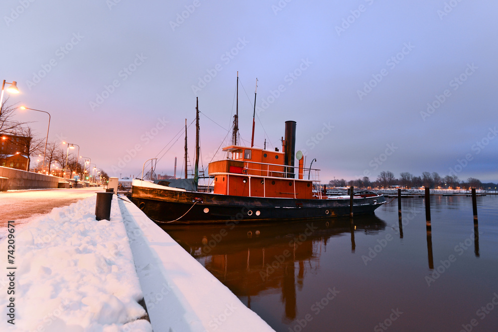 Boats moored in Helsinki in the winter Boats moored in Helsinki in the winter