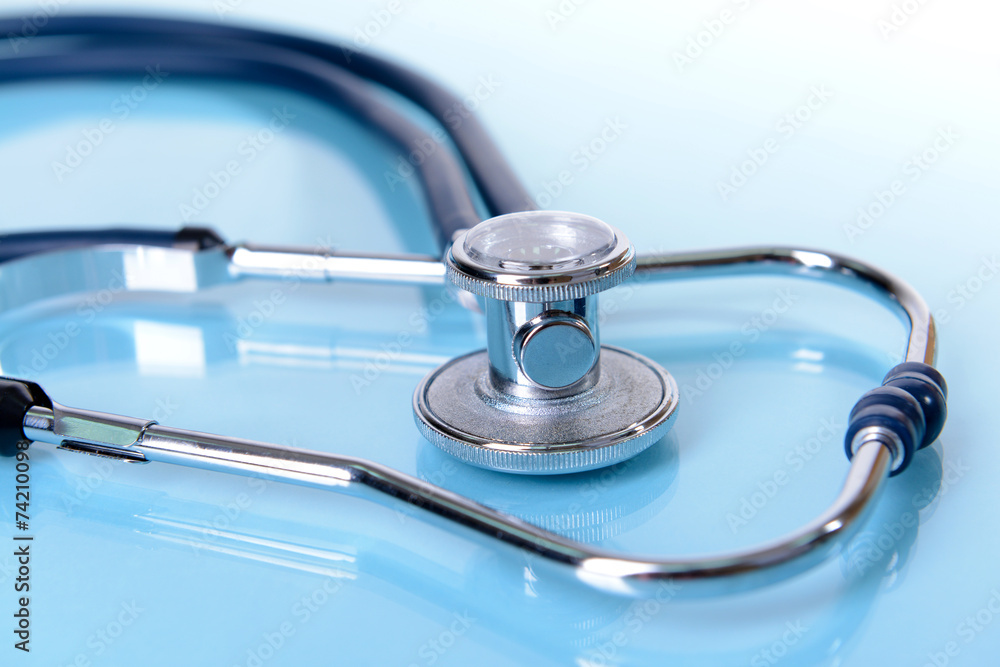 Stethoscope on light blue background Stethoscope on light blue background