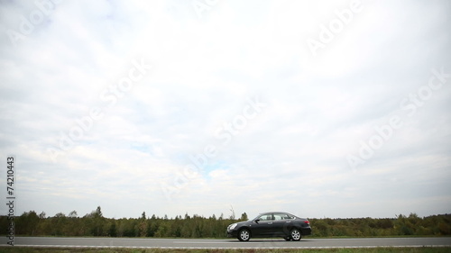 The car rides on the road photo