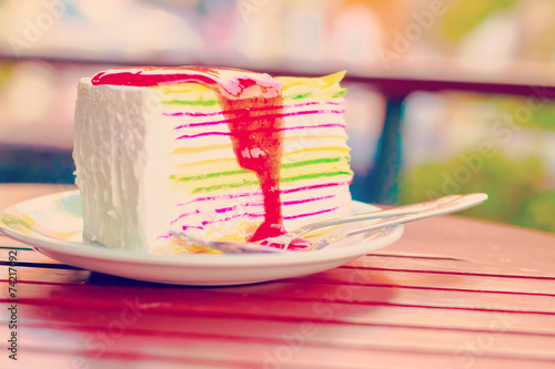 Rainbow crape cake with strawberry jam 