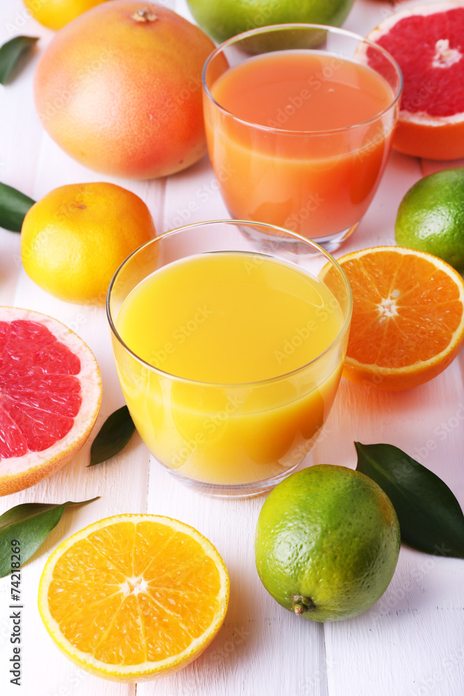 Juices and many citrus close-up Juices and many citrus close-up
