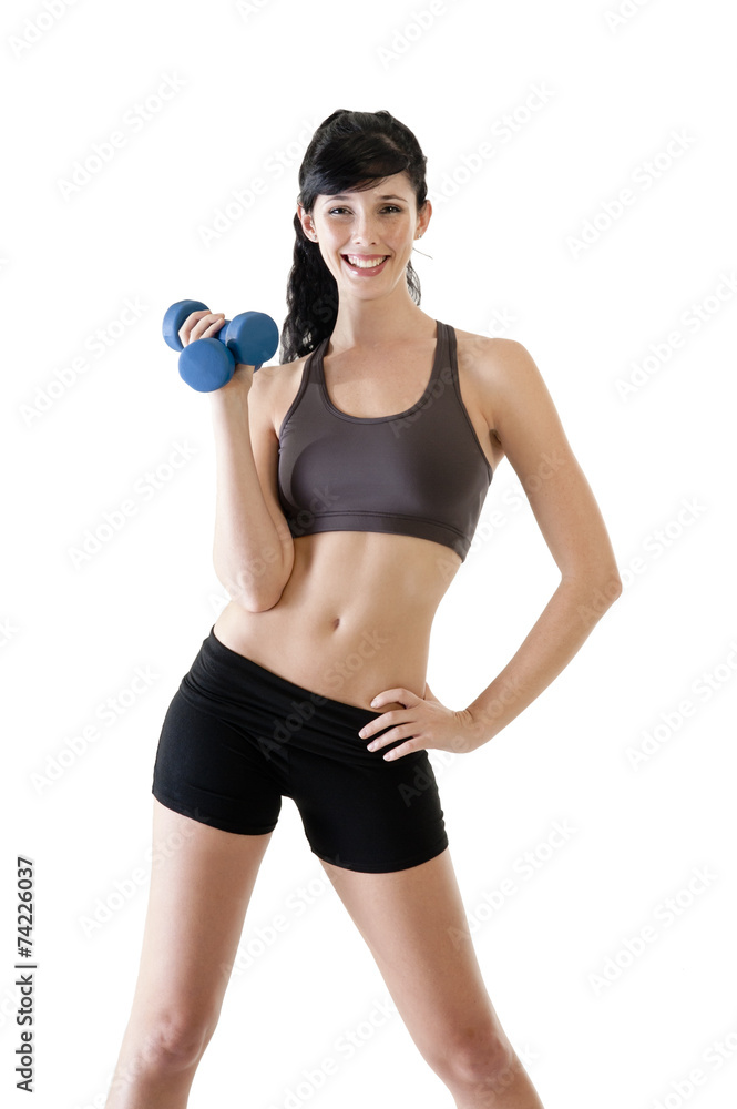 Young woman exercising with dumbbells isolated on white Young woman exercising with dumbbells isolated on white