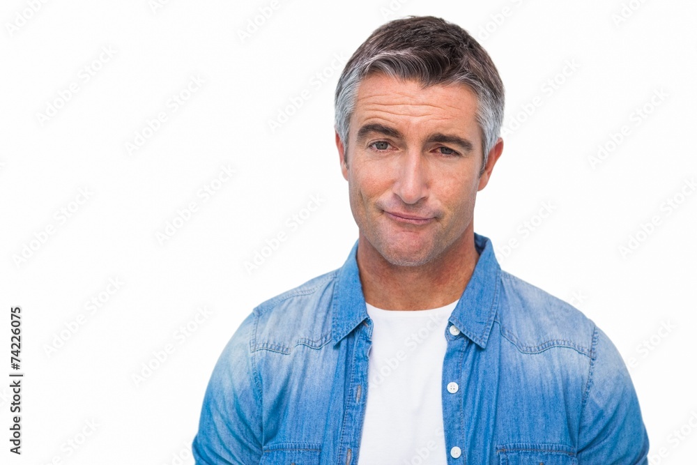 Portrait of a unsure man in casual clothes Portrait of a unsure man in casual clothes