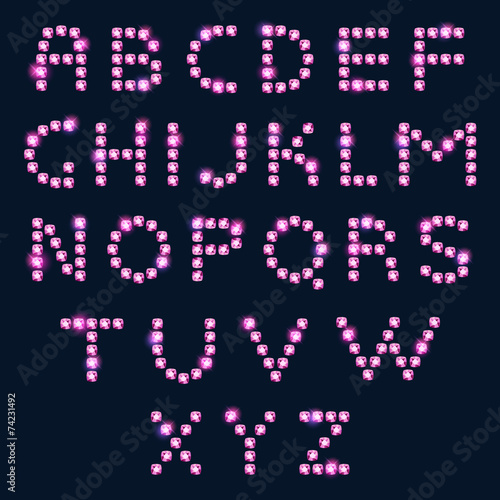 Pink diamond letters alphabet on dark background.