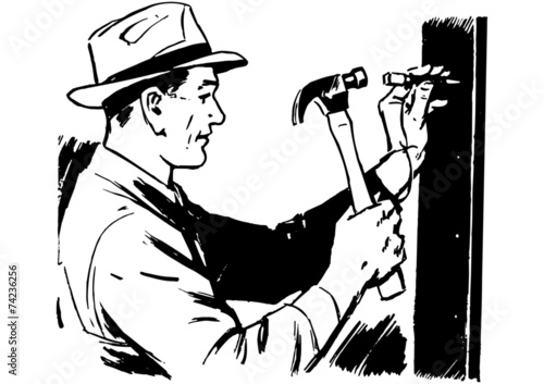 Man Hammering Nail