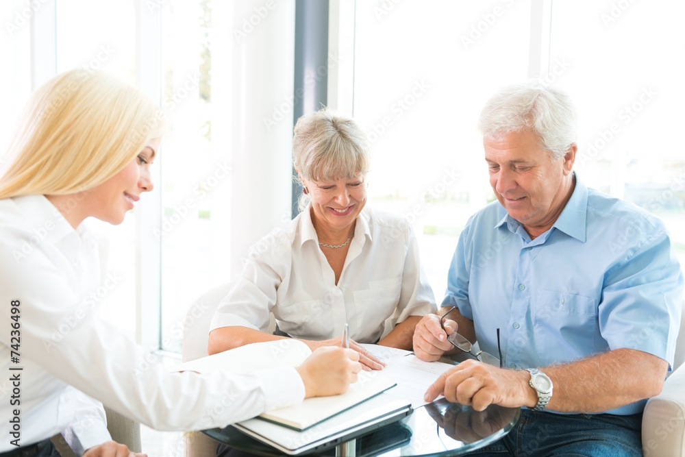Elderly couple purchasing life insurance Elderly couple purchasing life insurance