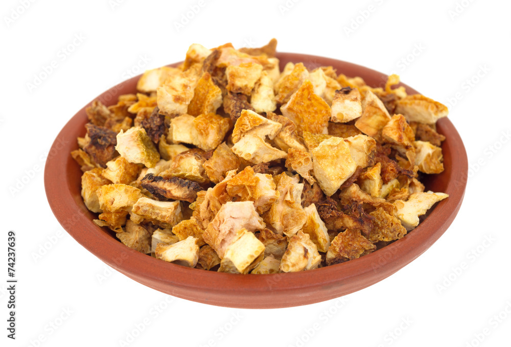Chopped orange peel rind in small bowl Chopped orange peel rind in small bowl