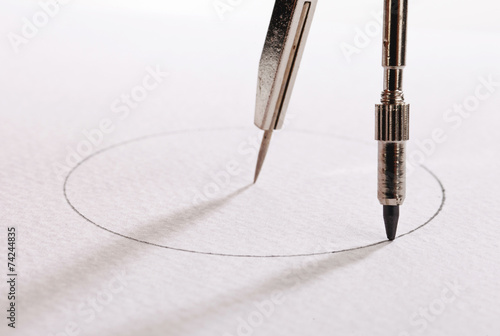 Obraz na plátně pair of compasses drawing circle