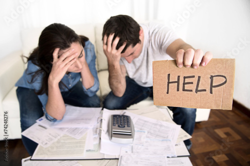 young couple home bad financial situation stress asking for help