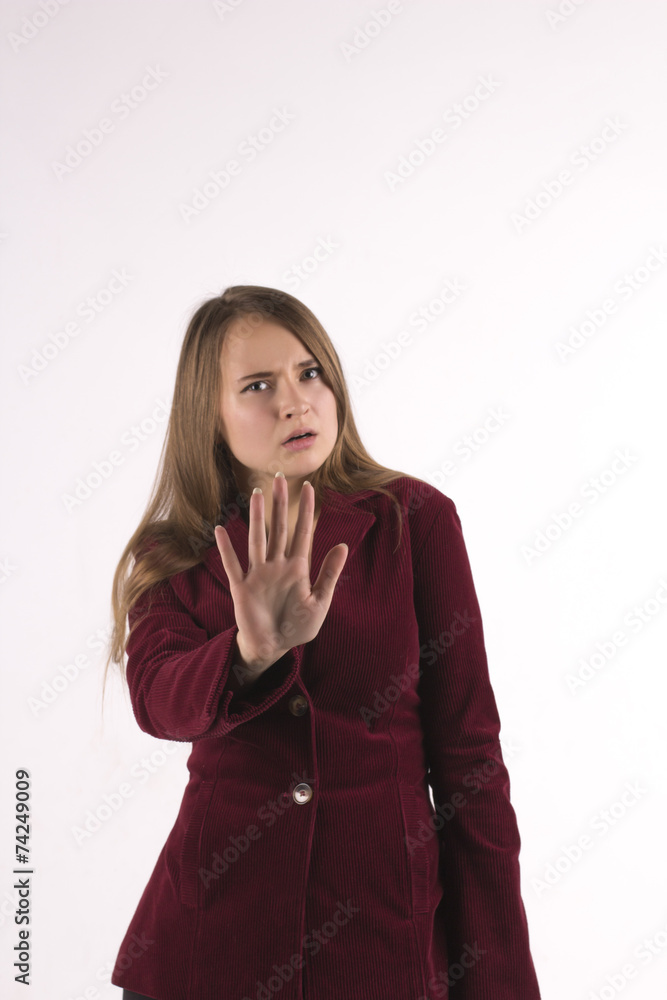 Serious woman making stop sign with his hand Serious woman making stop sign with his hand