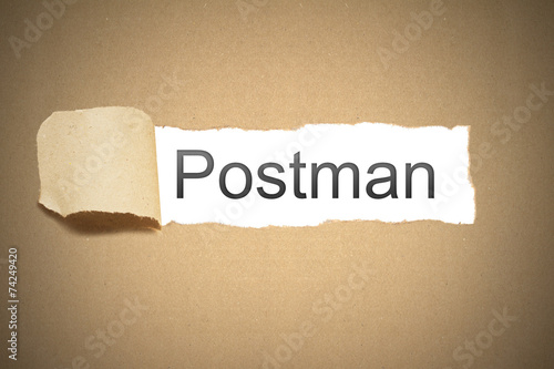 brown paper torn to reveal postman