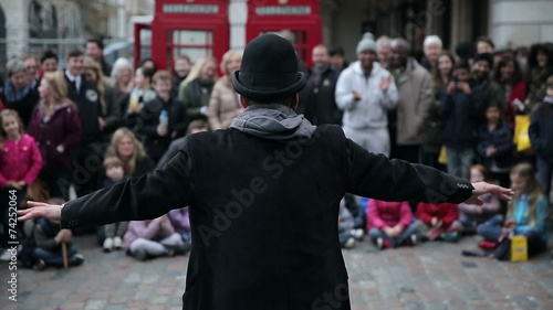 Street Artist in Front of Cheering Crowd in London