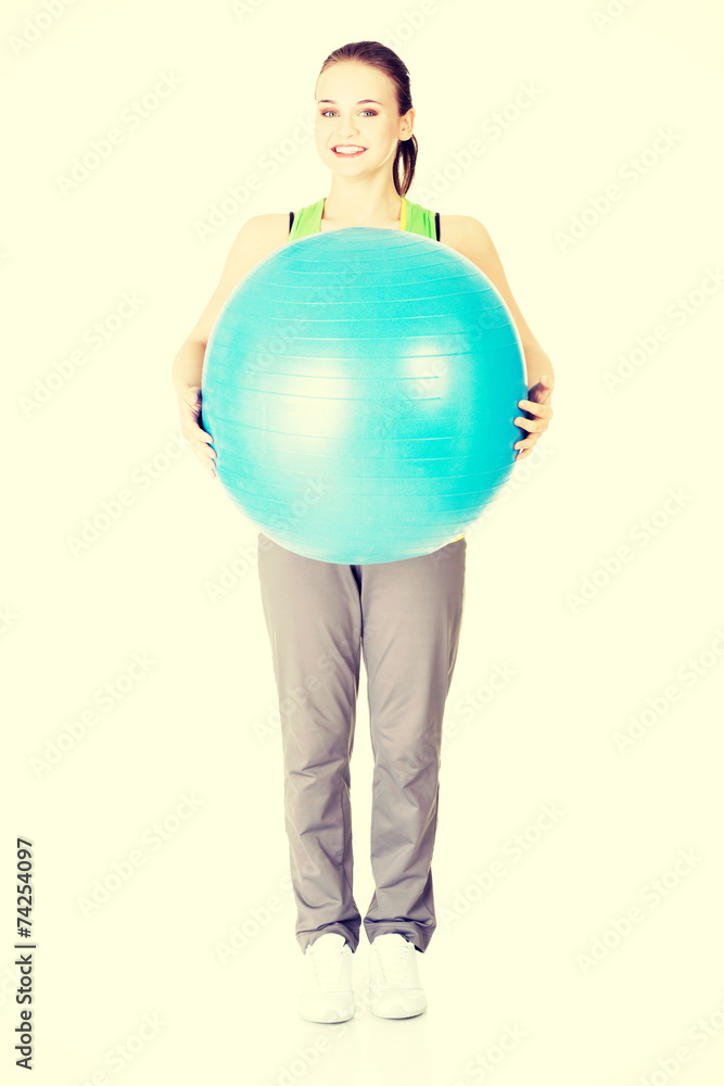 Healthy lifestyle woman with pilates exercise ball. Healthy lifestyle woman with pilates exercise ball.