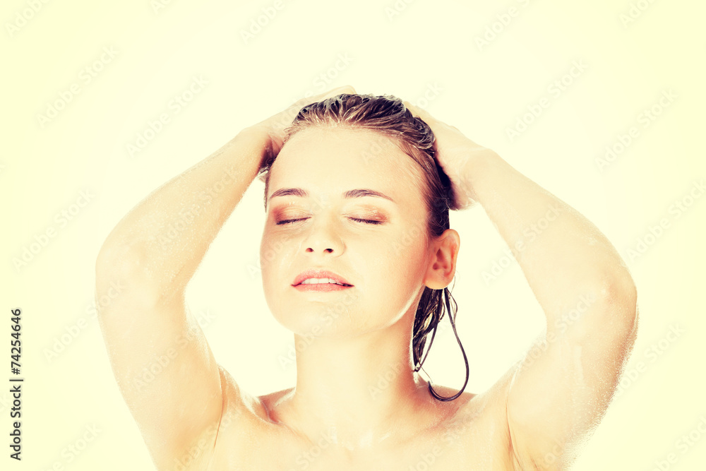 Fototapeta premium Young fit woman in shower