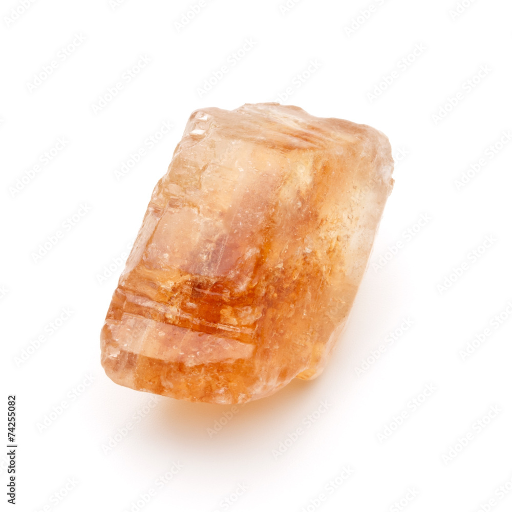 Brown caramelized lump cane sugar cube isolated on white backgro Brown caramelized lump cane sugar cube isolated on white backgro