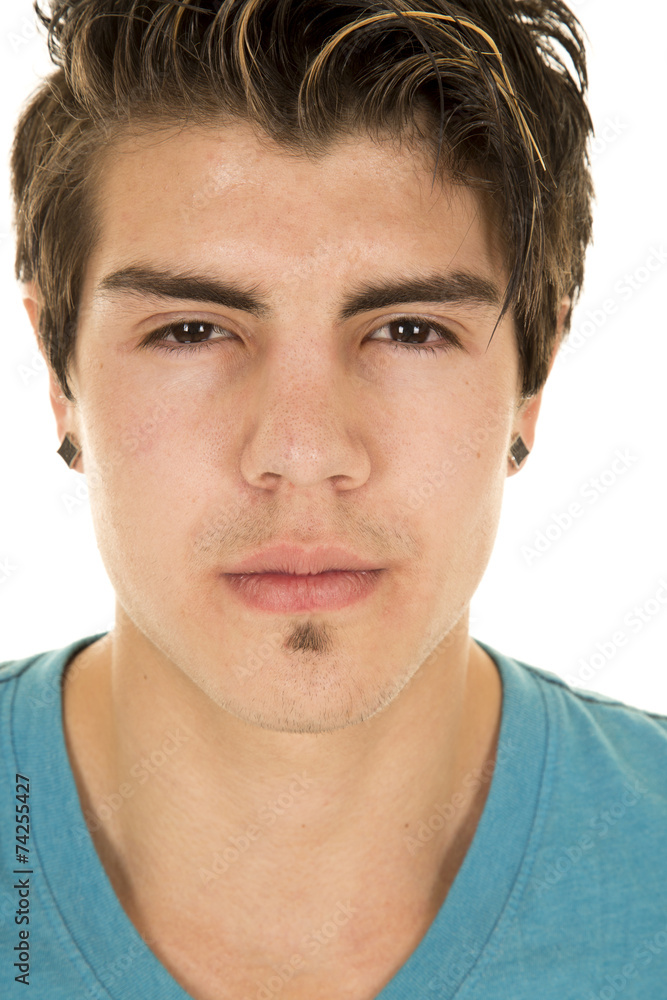 man in blue shirt head shot look serious man in blue shirt head shot look serious