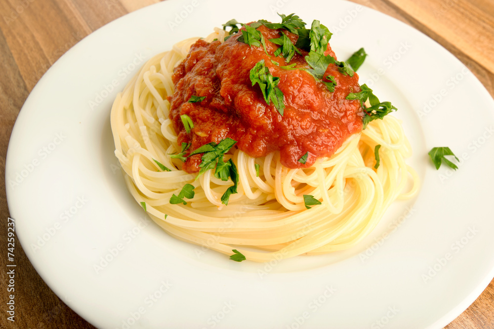 Spaghetti with tomato sauce and parsley Spaghetti with tomato sauce and parsley