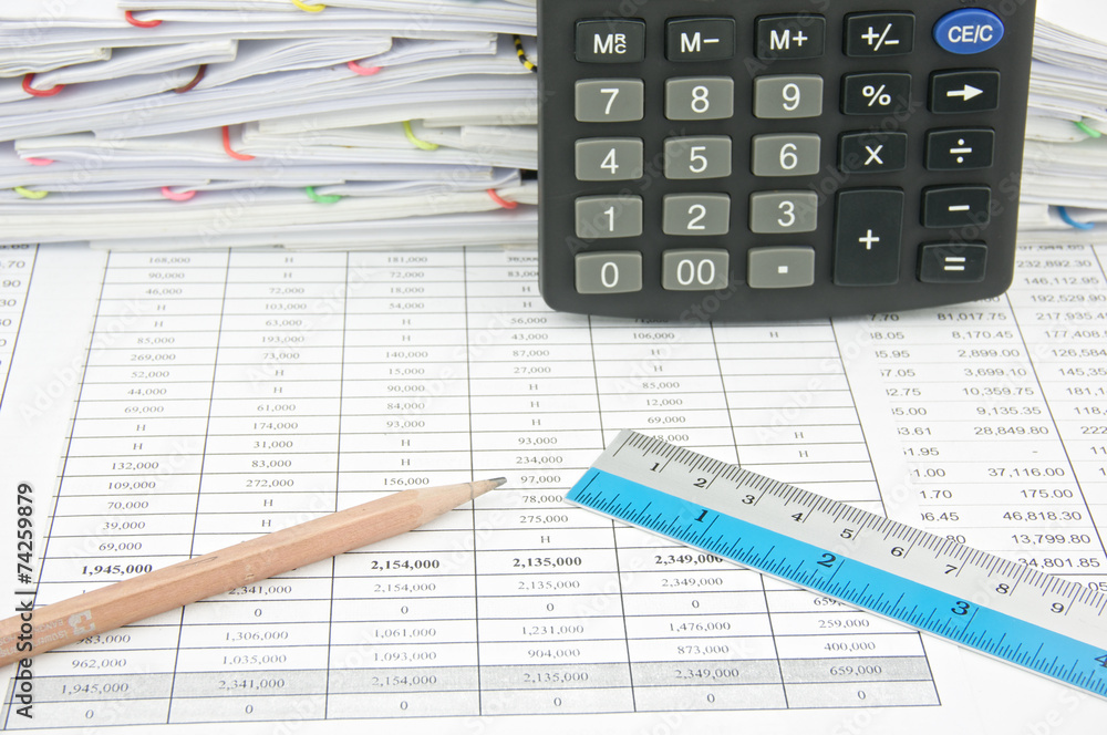 Brown pencil and ruler with calculator