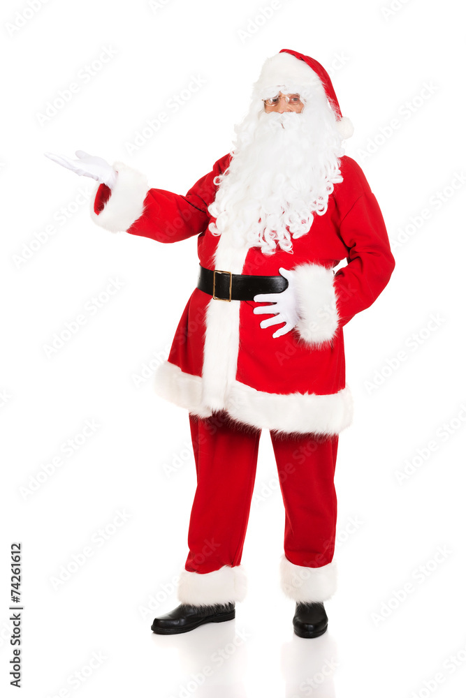 Full length Santa Claus with a welcome gesture Full length Santa Claus with a welcome gesture