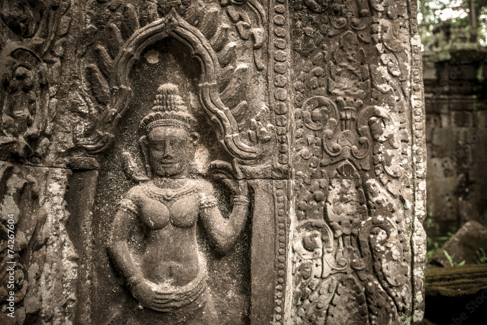 The Apsara decoration at the corner of Bayon temple in Siem Reap, Cambodia. The Apsara decoration at the corner of Bayon temple in Siem Reap, Cambodia.