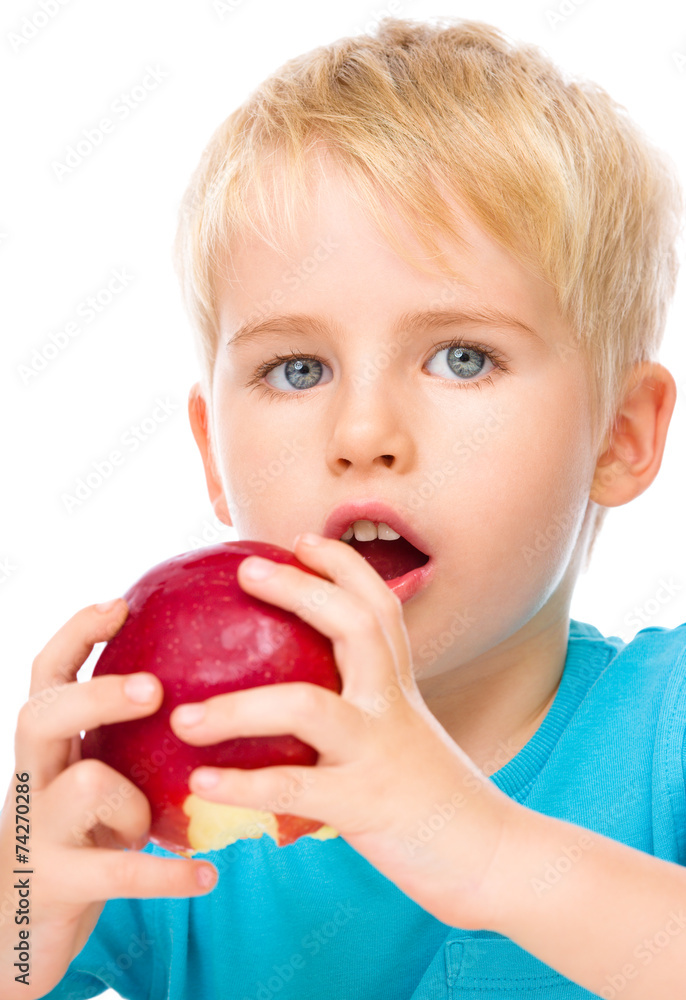 Portrait of a cute little boy with red apple Portrait of a cute little boy with red apple