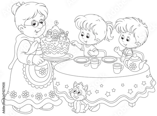Granny and grandchildren with a Christmas cake