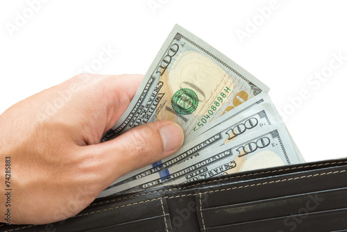 hand picking dollar bill from wallet, isolated