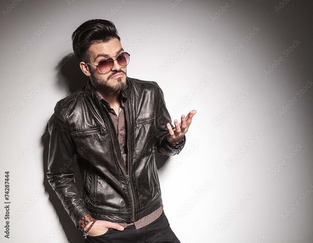Fototapeta premium Young fashion man explaining something.
