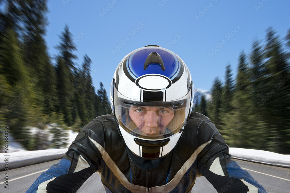 Motorcyclist on mountain road Motorcyclist on mountain road