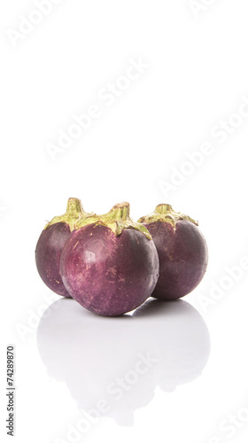 Round shape eggplant over white background