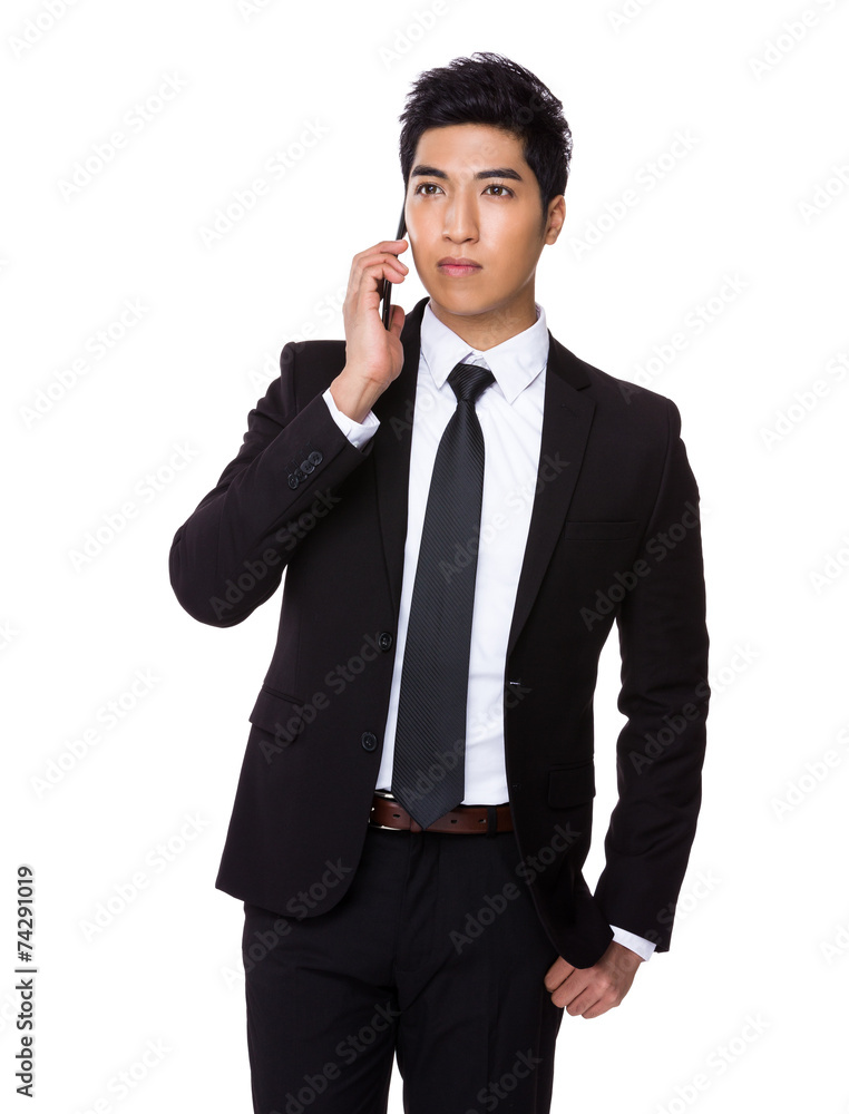 Businessman talk to cellphone Businessman talk to cellphone