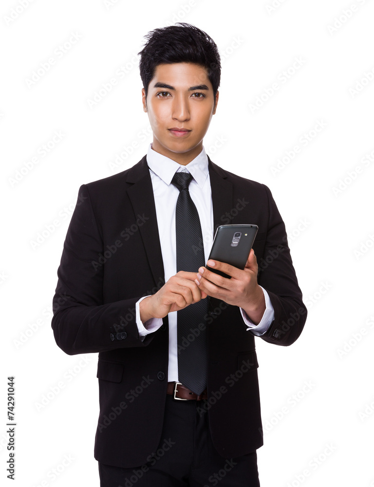 Businessman use of cellphone Businessman use of cellphone