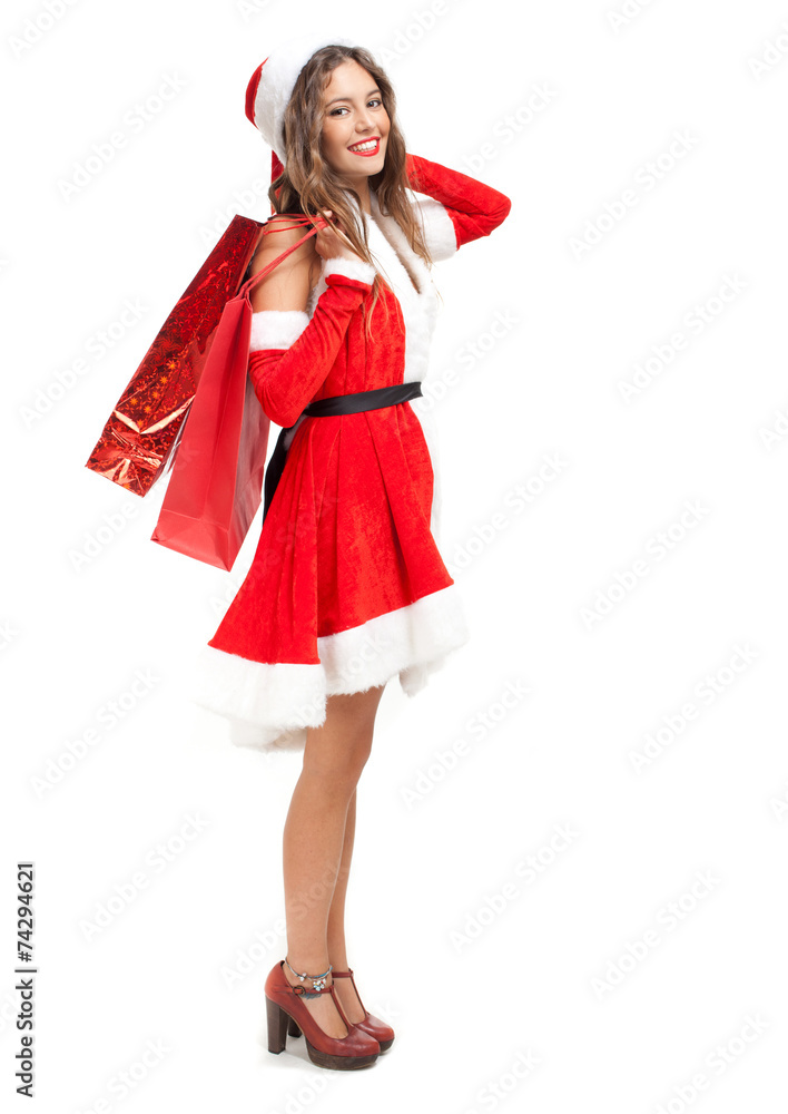 Beautiful Santa Claus woman holding shopping bags Beautiful Santa Claus woman holding shopping bags