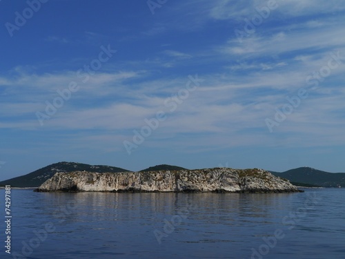 A rockl island in the Adriatic sea near the island Ist