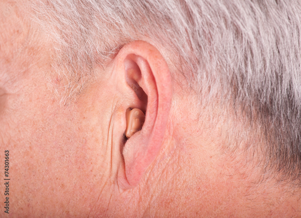 Fototapeta premium Cic hearing aid in the ear