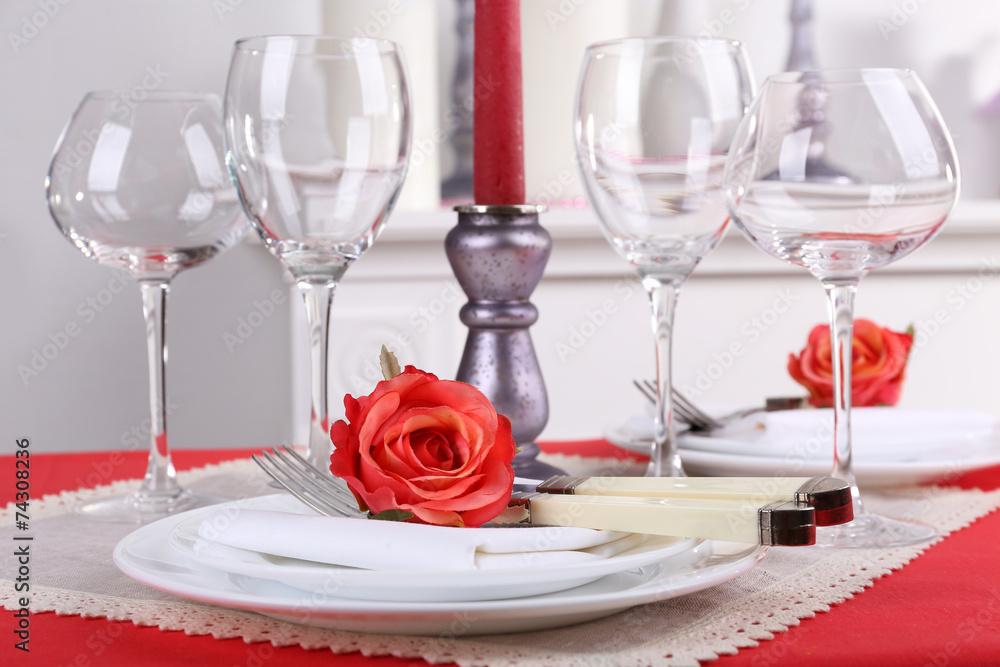 Festive table setting on room background Festive table setting on room background