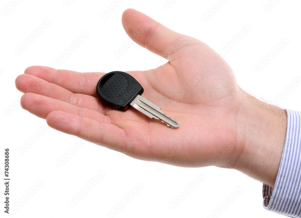 Businessman holding car key isolated on white Businessman holding car key isolated on white
