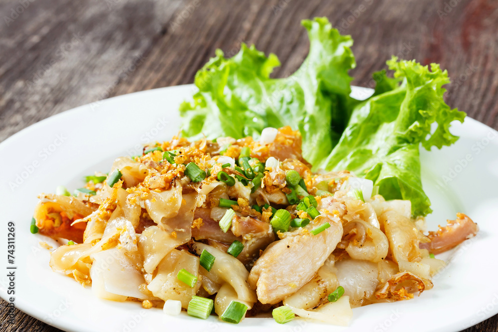 Stir fried fresh rice fat noodles with chicken and egg Stir fried fresh rice fat noodles with chicken and egg