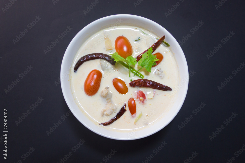 Coconut milk soup with chicken isolated background Coconut milk soup with chicken isolated background